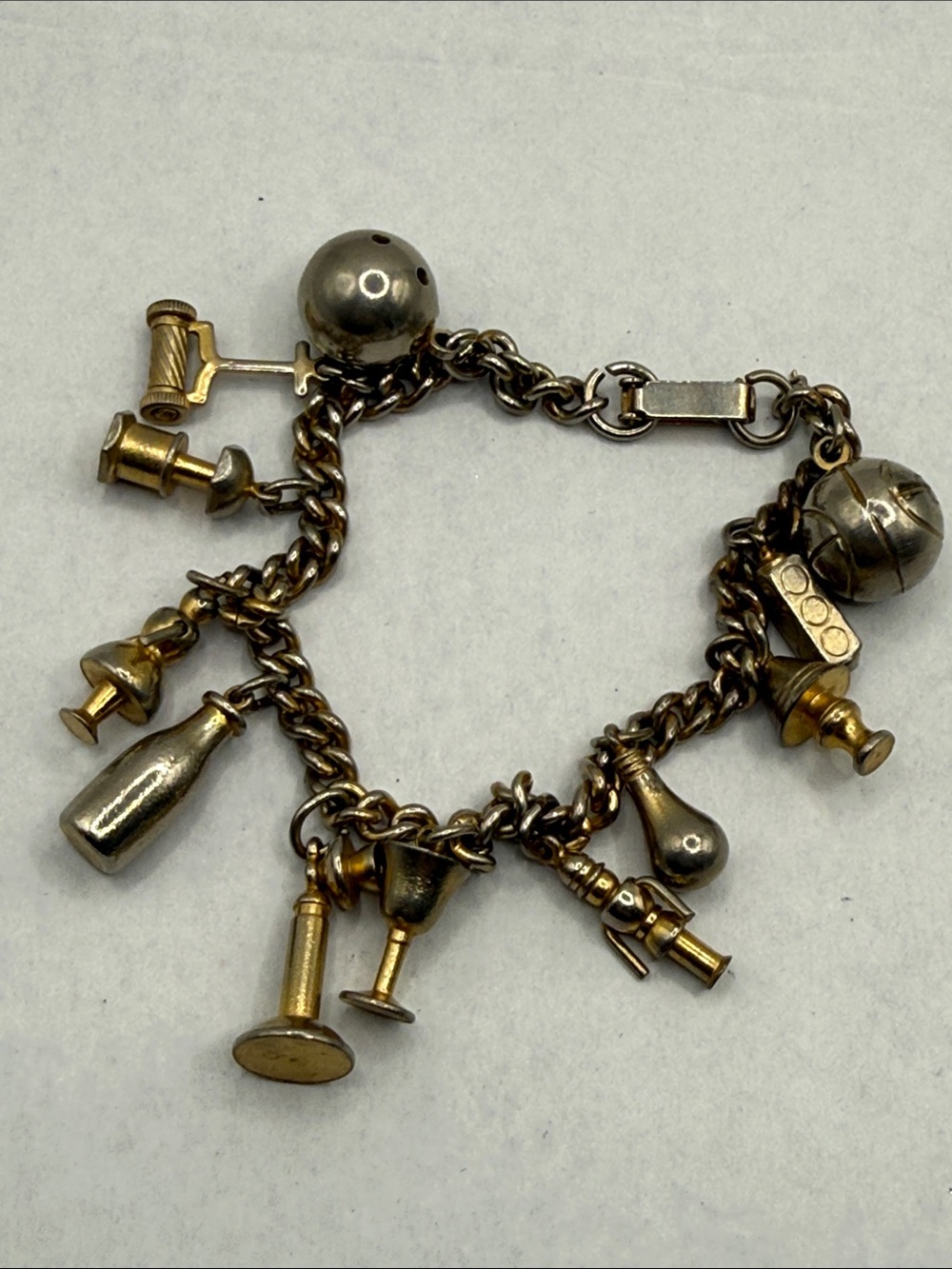 Vintage very old Mixed Metal Charm Bracelet - Sports & Tools Charms nutcracker